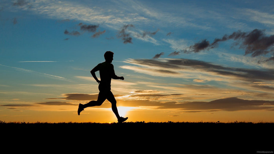 Person running outdoors, showcasing movement, athletic performance, and an active lifestyle.