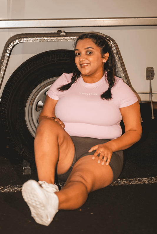 Monletics- Petal pink top, compression gym top with 3D logo facing forward 